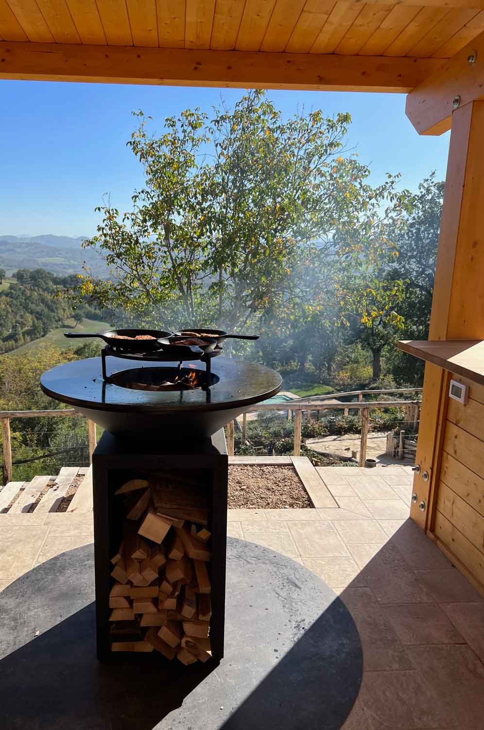 The communal outdoor kitchen with Ofyr BBQ